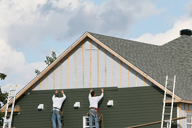 Professional Siding technician working in Forbes Road, PA